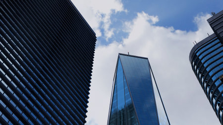 Low angle view of futuristic architecture, Skyscraper of office buildings glass window, 3D...