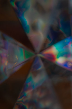Abstract textured gradient blur with deep blues, teals, pinks, and purples. Soft holographic...