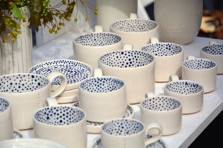 Nicely decorated and served dining. Ceramic cups and saucers.の写真素材