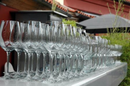 Empty wine glasses. Preparing for a party.の写真素材