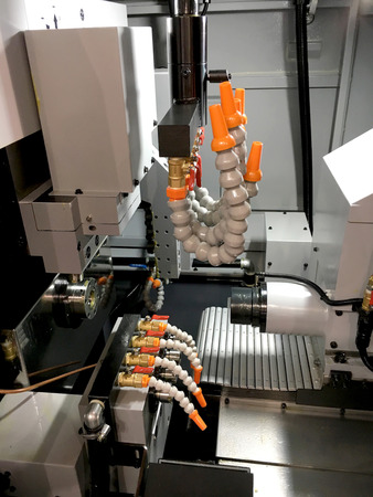 Operator make automotive parts by cnc lathe. Machining lathe.の写真素材