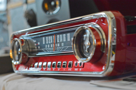Old retro radio with on tableの写真素材