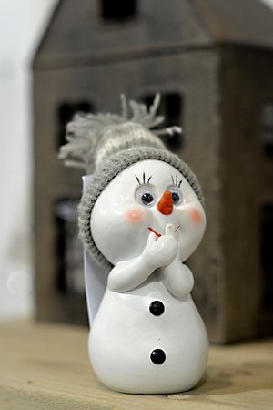 Little snowman with white capの写真素材