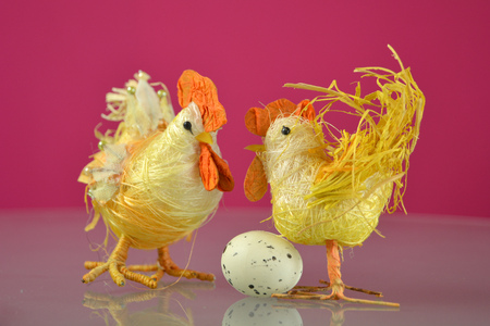 Easter tap and hen  on red backgroundの写真素材