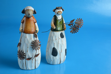 Ceramic easter sheep on blue backgroundの写真素材