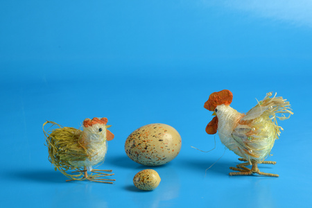 Easter tap and hen  on blue backgroundの写真素材