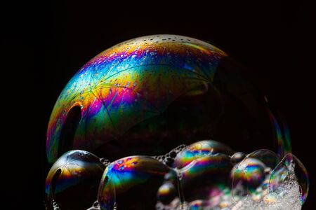 Soap bubbles on a black backgroundの写真素材