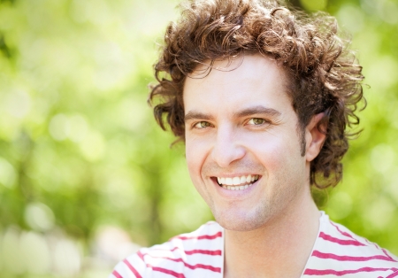 A portrait of a handsome man smiling.の写真素材