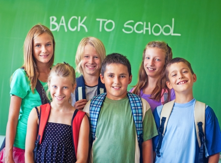 A group of elementary students ready for their first lesson.の写真素材