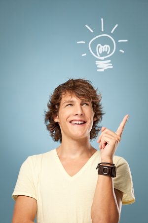 A young man thinking about a brilliant idea.の写真素材