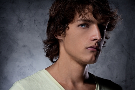 A portrait of a young man looking scary and displeased.の写真素材