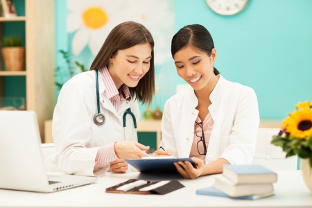 Two pediatricians working together.の写真素材