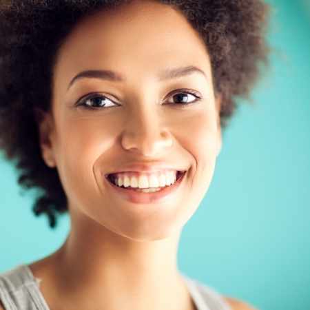 Portrait of a beautiful smiling African woman.の写真素材