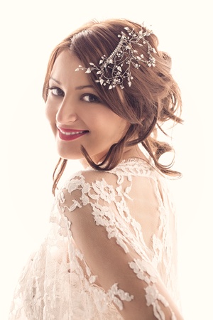 Portrait of a beautiful young bride smiling.の写真素材