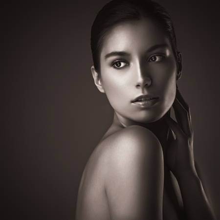 Portrait of a beautiful young brunette in black and white.の写真素材