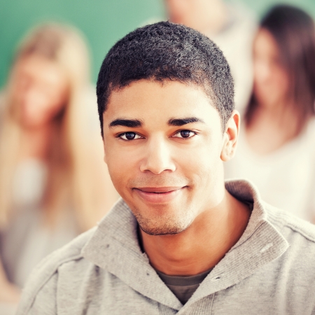 Smiling African college student in close-up.の写真素材