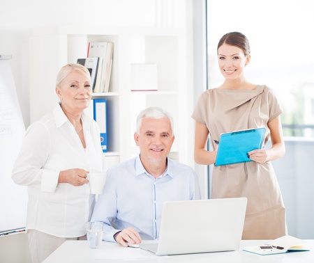 Business people posing together at their office.の写真素材
