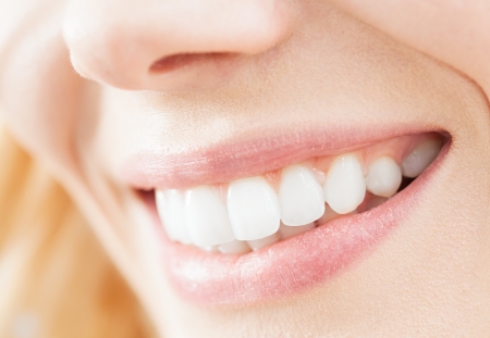 A close-up of a beautiful woman smile.の写真素材