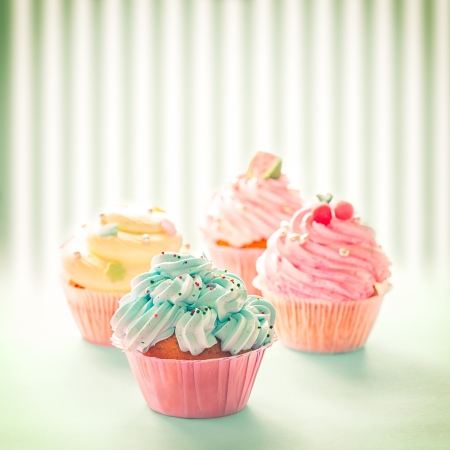 Delicious colourful cupcakes in close-up.の写真素材