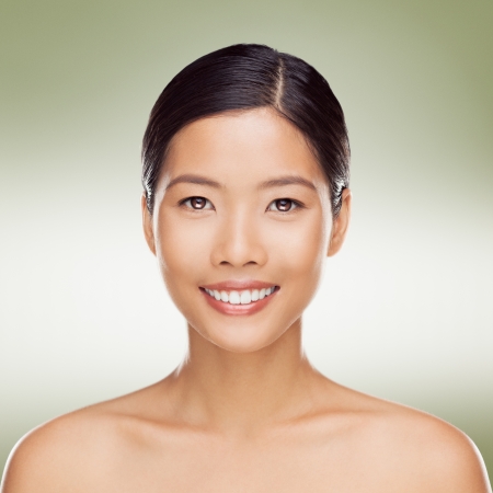 Portrait of a beautiful young Asian woman smiling.の写真素材