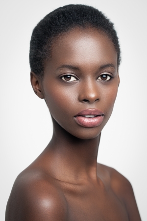 Sensual African woman against a white background.の写真素材