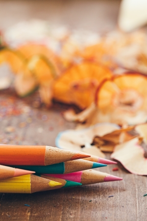 Sharpened colour pencils and pencil shavings in close-up.の写真素材