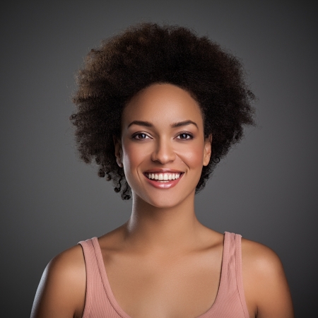 Portrait of a beautiful smiling African woman.の写真素材