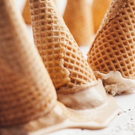 Ice-cream cones with ice-cream turned upside down.の写真素材