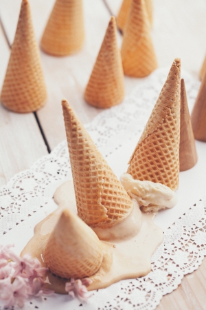 Ice-cream cones with ice-cream turned upside down.の写真素材