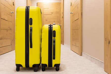 Two suitcases in a hallway.の写真素材