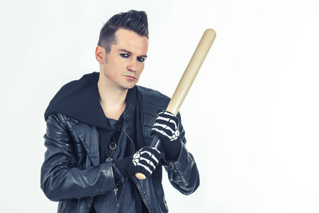 Hooligan with a baseball bat on white background.の写真素材