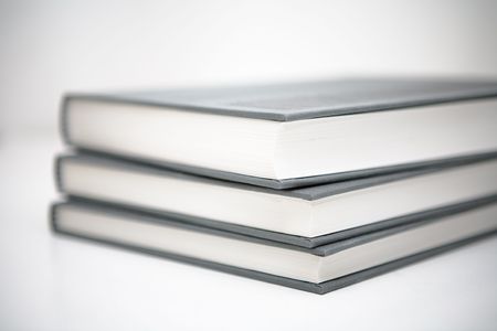 Books piled in abstract environmentの写真素材