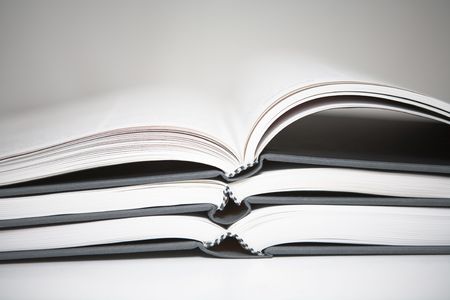 Books piled in abstract environment