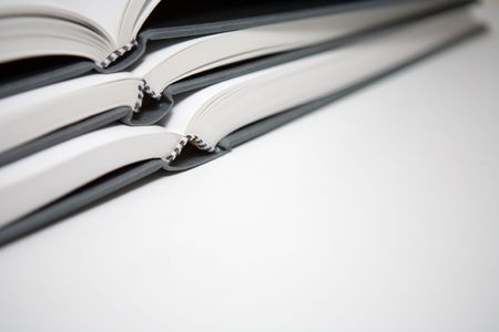 Books piled in abstract environmentの写真素材