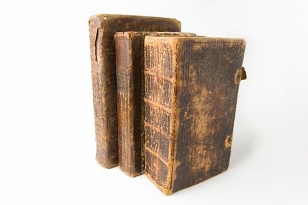 Row of antique books on a white backgroundの写真素材