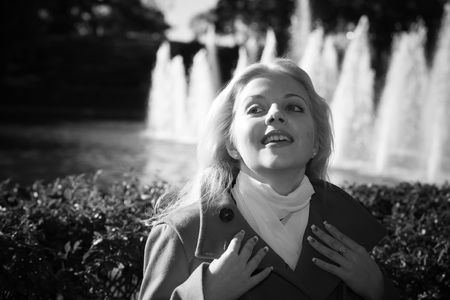 B&W portrait of young woman in parkの写真素材