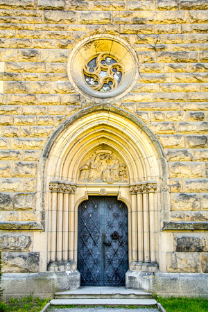 Antique metal doors in the arch. Moszna Castleのeditorial素材