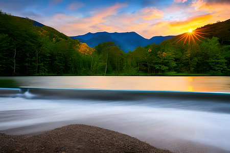 Beautiful lake in the mountains at sunset. Beautiful nature landscape photo that captures the beauty and diversity of natureの素材