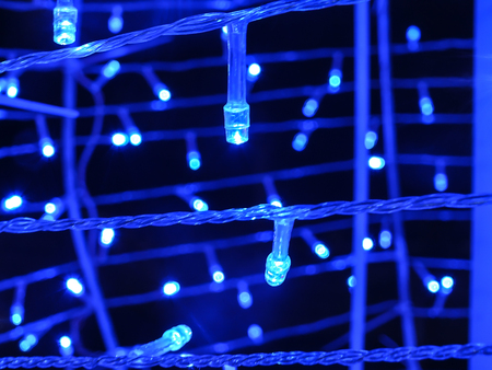 Decoration light over dark blue backgroundの写真素材