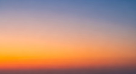 Sunset sky background. Sunset sky background. Sunset sky with clouds.の素材