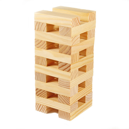 Pile childrens wooden cubes on an isolated backgroundの写真素材