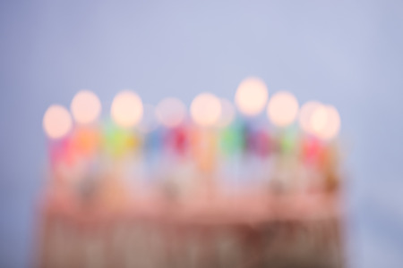 blurred out of focus birthday cake background conceptの写真素材