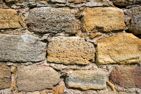 Stone wall fragment from an old medieval castleの写真素材