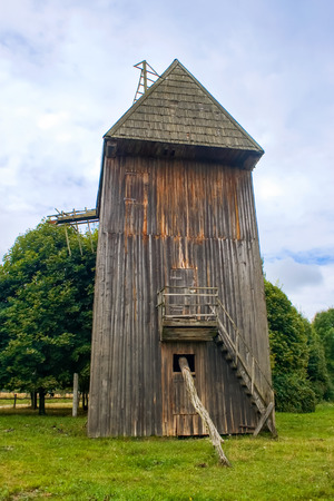 Authentic Ukrainian wooden windmill in Rokyni Skansen, Ukraineの写真素材