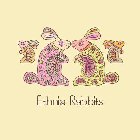 Colorful rabbits in ornate ethnic style. Hand drawn vector illustration with a cute doodling design. Soft lovely palette (yellow, pink, green).の写真素材