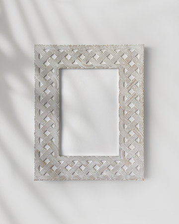 White vintage photo frame mockup, vertical artwork on a white wall, front view templateの写真素材
