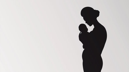 Mother holding baby silhouette motherhood conceptの素材