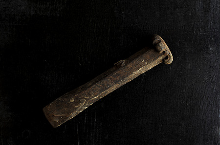 Still life with old chisel steel material on wooden black boardの写真素材