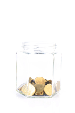 Glass bottle piggy bank on white backgrounds for saving plan ideas conceptの写真素材