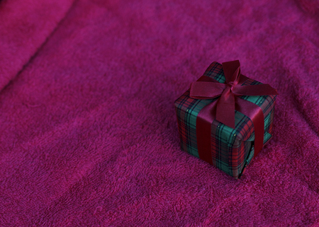 Gift box on red carpet backgrounds for chirstmas themes conceptの写真素材